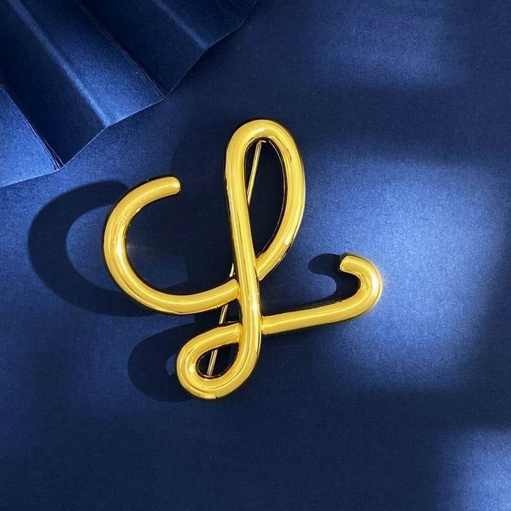 Broche LOEWE doré